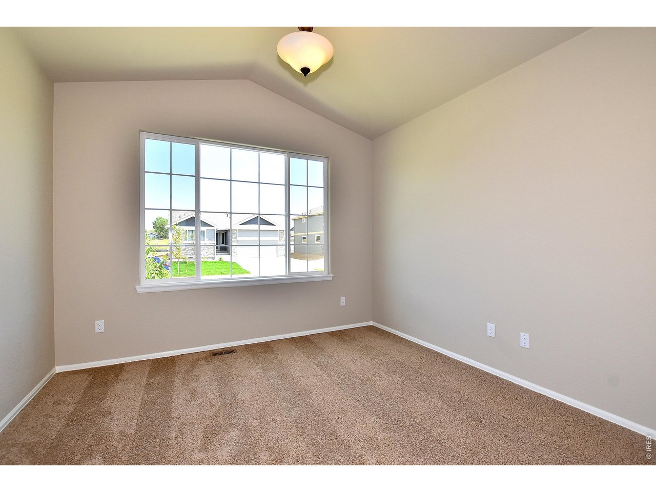 500 85th Avenue Greeley, CO 80634 - Photo 18 of 39 a view of an empty room with a window