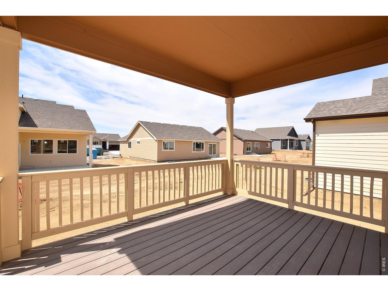 500 85th Avenue Greeley, CO 80634 - Photo 25 of 39 a view of a porch with wooden floor