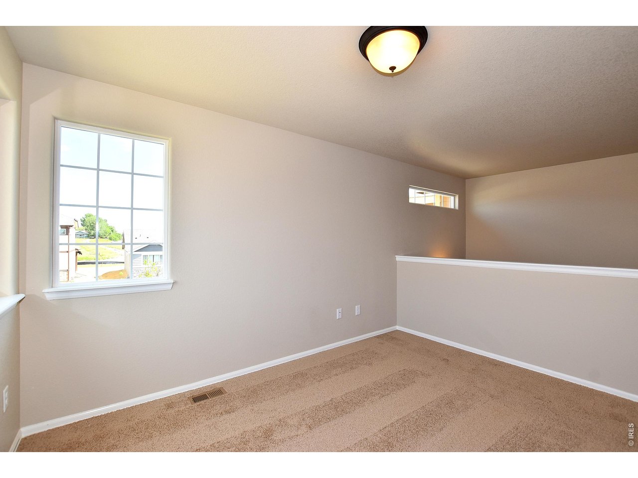 500 85th Avenue Greeley, CO 80634 - Photo 28 of 39 a view of an empty room with a window