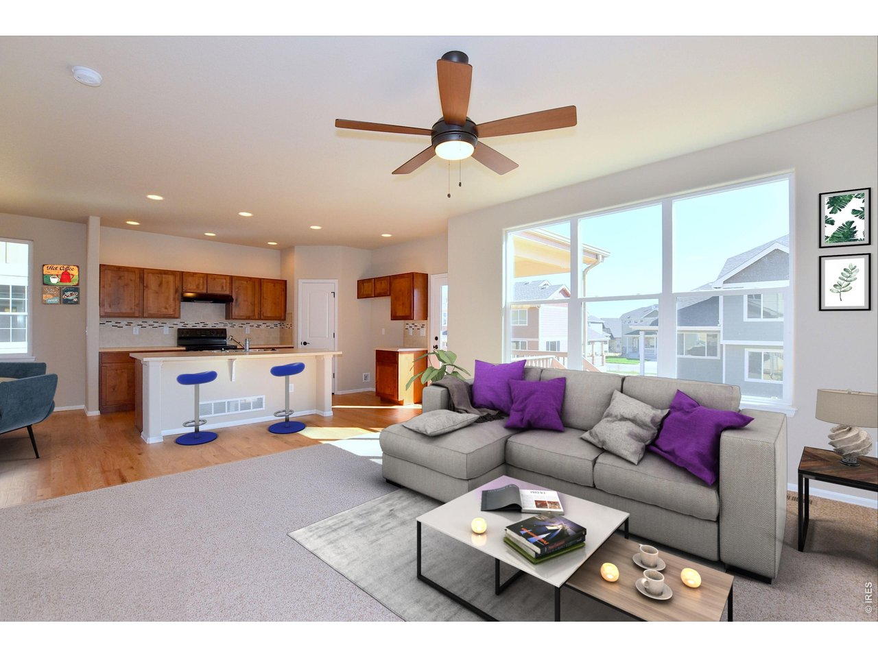 500 85th Avenue Greeley, CO 80634 - Photo 3 of 39 a living room with furniture and a large window