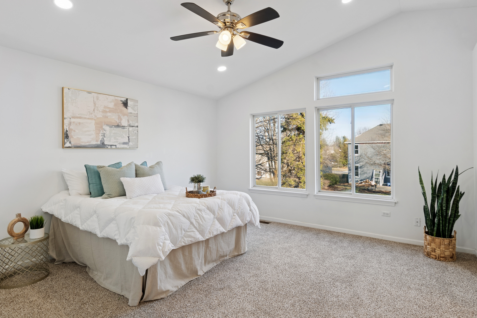 206 Sparrow Lane Bolingbrook, IL 60490 - Photo 11 of 22 a bedroom with a bed painting on wall and a large window
