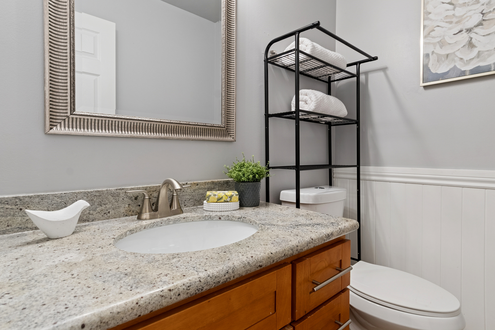 206 Sparrow Lane Bolingbrook, IL 60490 - Photo 10 of 22 a bathroom with a granite countertop sink a toilet and mirror