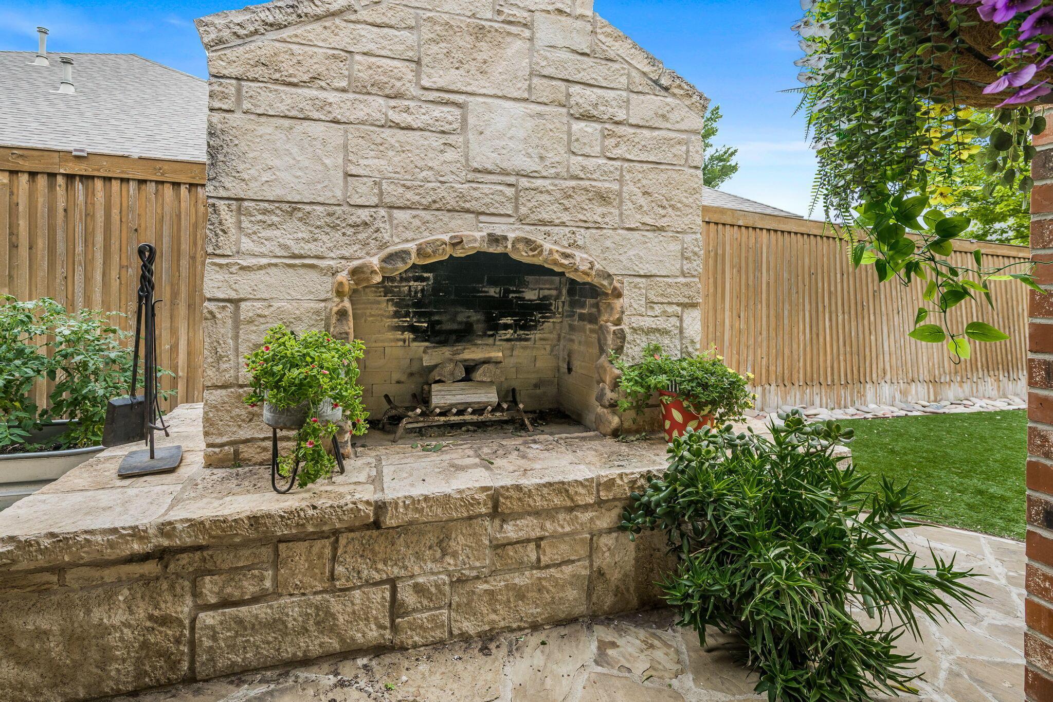 7619 Countryside Drive Amarillo, TX 79119 - Photo 35 of 41 outside fireplace