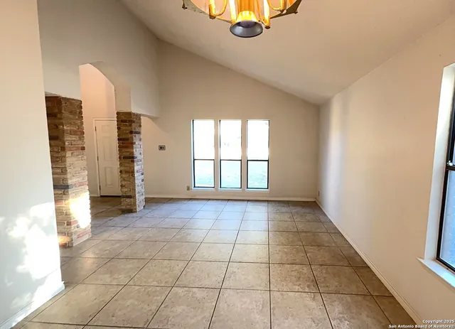 a view of an empty room and window