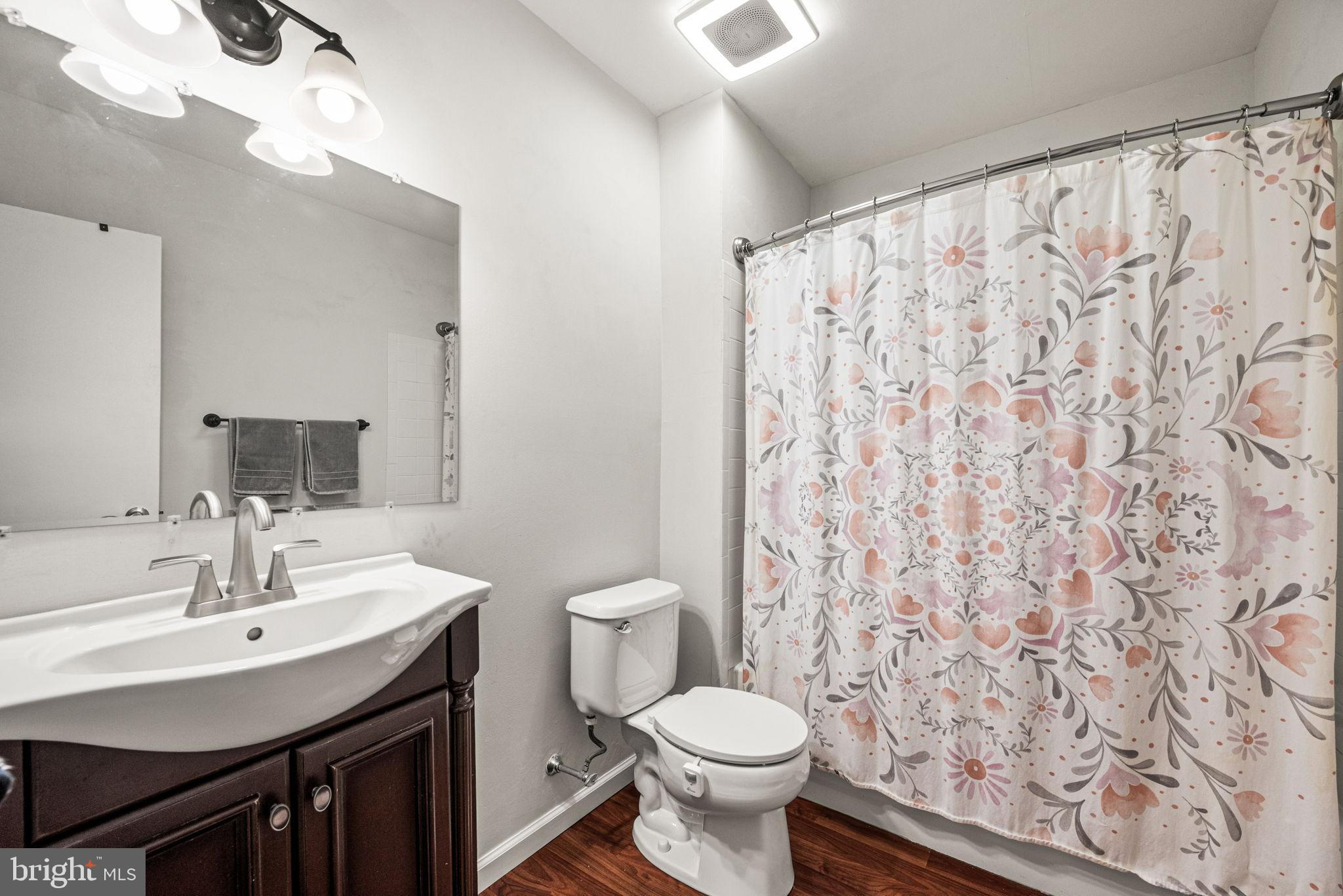 22 Fitzwatertown Road, Unit F4 Willow Grove, PA 19090 - Photo 18 of 20 a bathroom with a sink and a toilet