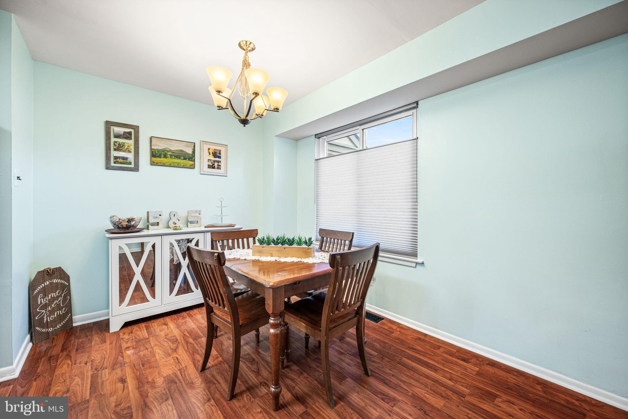 22 Fitzwatertown Road, Unit F4 Willow Grove, PA 19090 - Photo 5 of 20 a view of a dining room with furniture and a chandelier