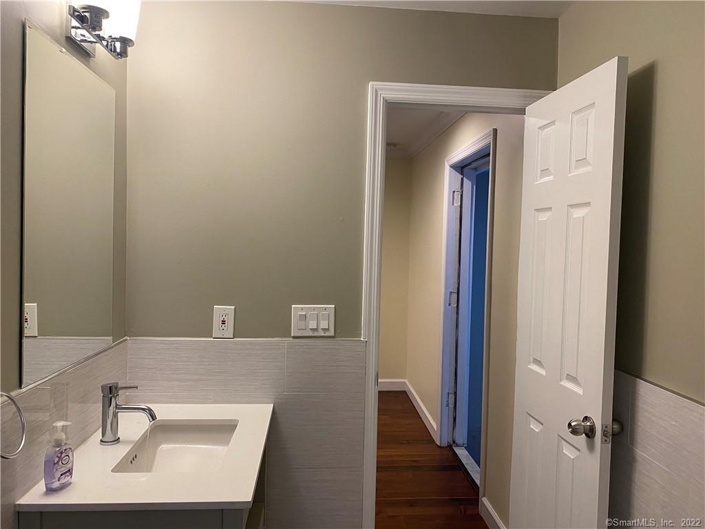 201 West Norwalk Road Norwalk, CT 06850 - Photo 15 of 40 Half Bath near by the Sun Room (Main Level)