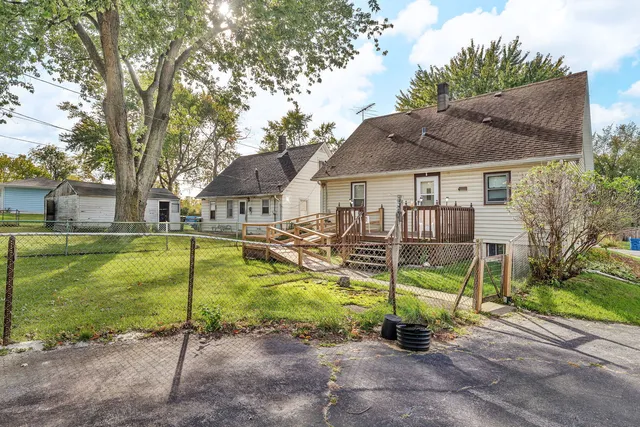 a view of a swimming pool with a patio