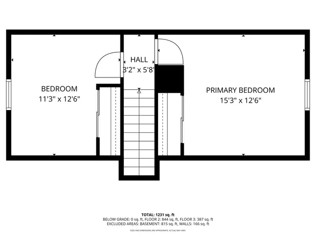 a black and white photo of a living room