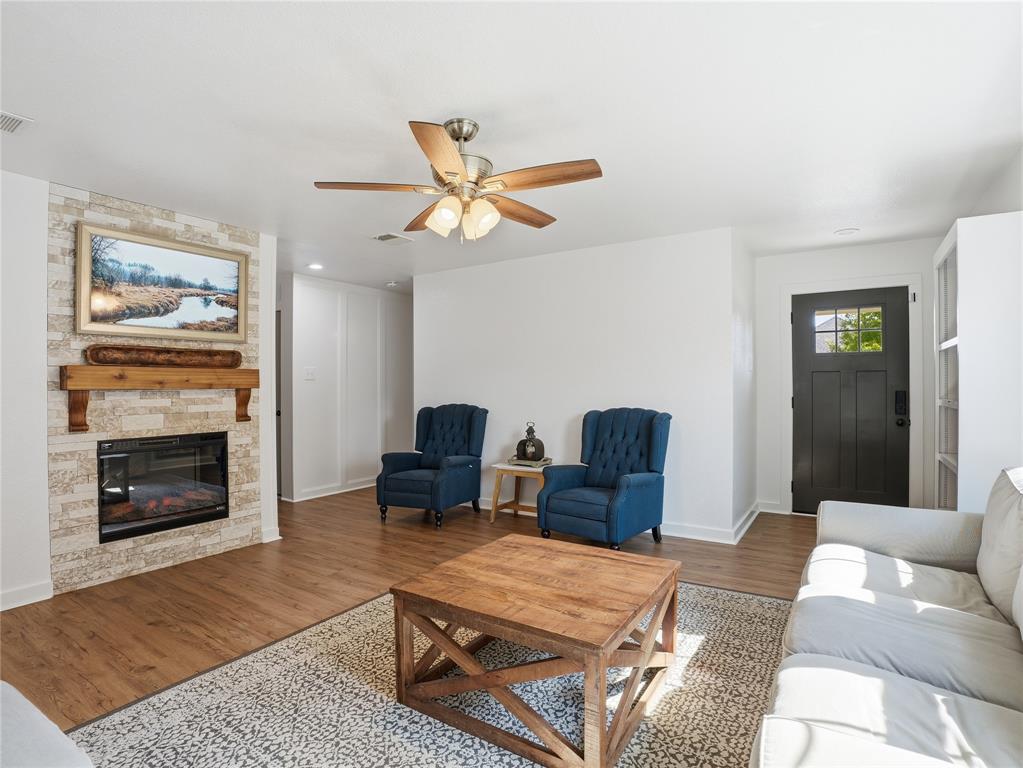 12724 Carpenter Lane Rhome, TX 76078 - Photo 6 of 37 Living area featuring wood-finish flooring, a ceiling fan with light kit, and recessed lighting