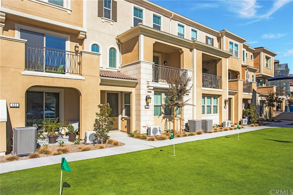 404 Coyote Pass Blanchard, ID 83804 - Photo 2 of 22 a front view of a building with a garden
