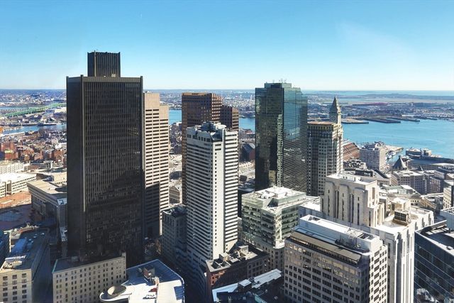 a view of city with tall buildings