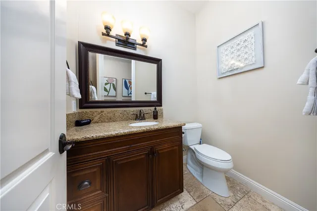 a view of a storage and utility room with washer and dryer
