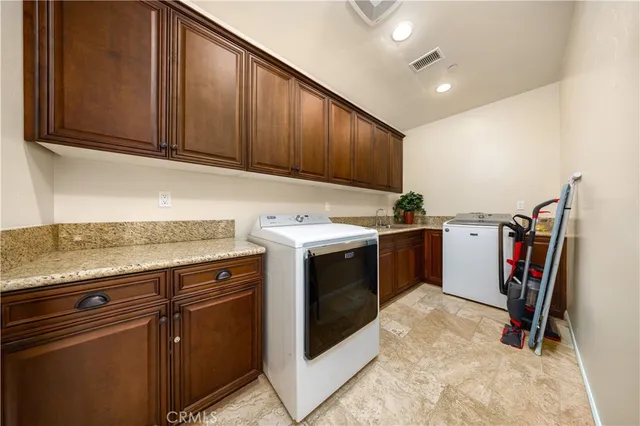 a view of a kitchen cabinets and wooden floor