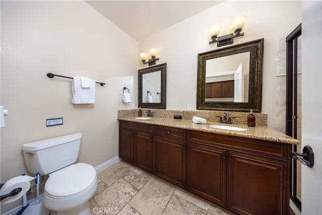 a bedroom with bed and window