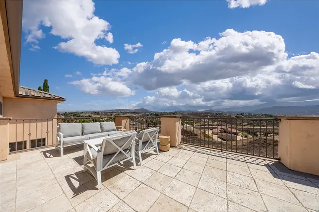 a view of a terrace with television and stove