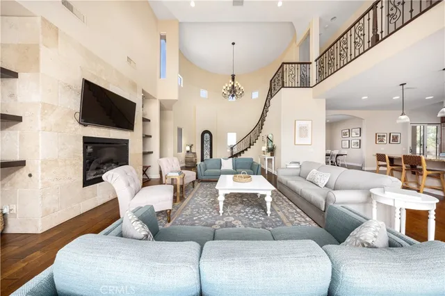 a living room with furniture or couch and a large window