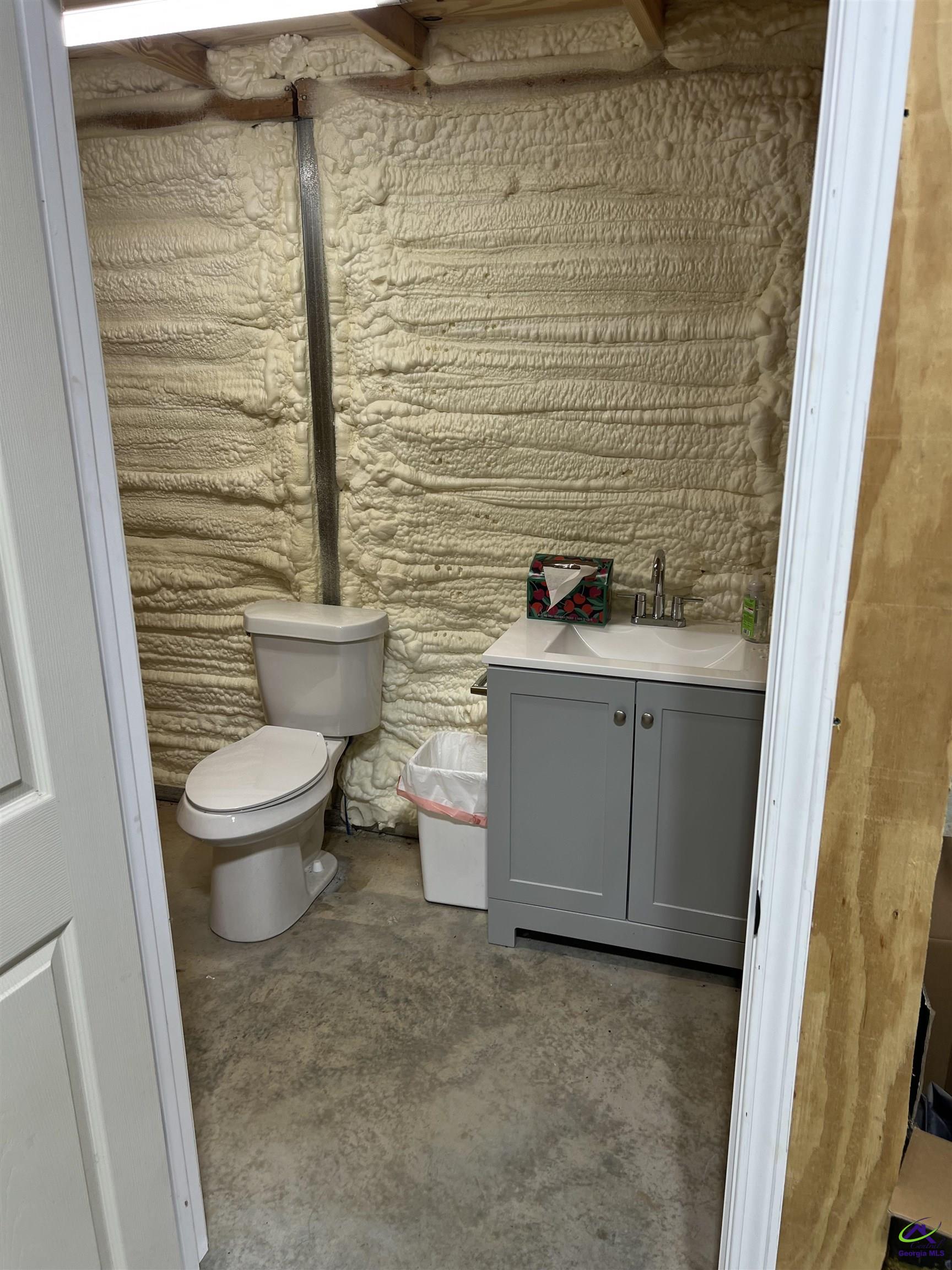 2203 Old Macon Road Montrose, GA 31065 - Photo 59 of 64 a bathroom with a toilet and a sink