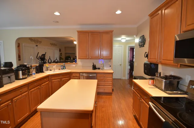 a view of a dining room with furniture and window