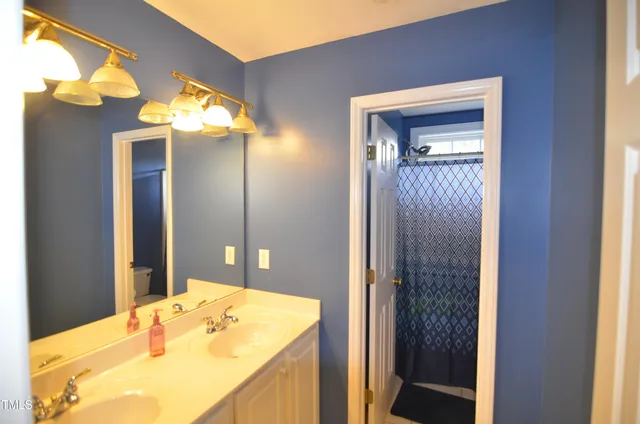 a room with gym equipment and a window