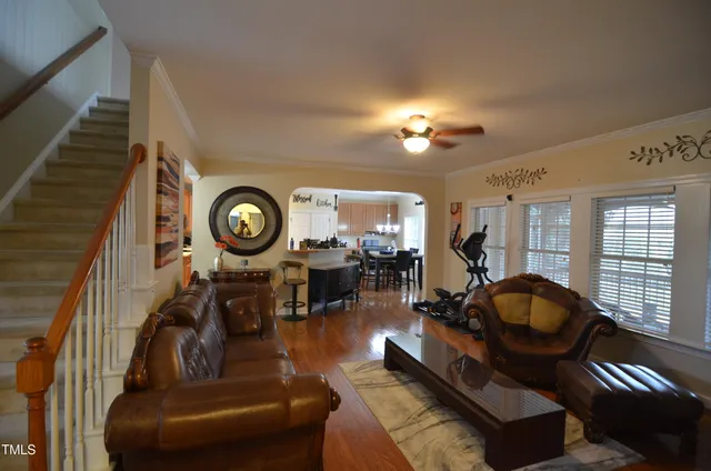 a view of a kitchen with kitchen island dining table and chairs