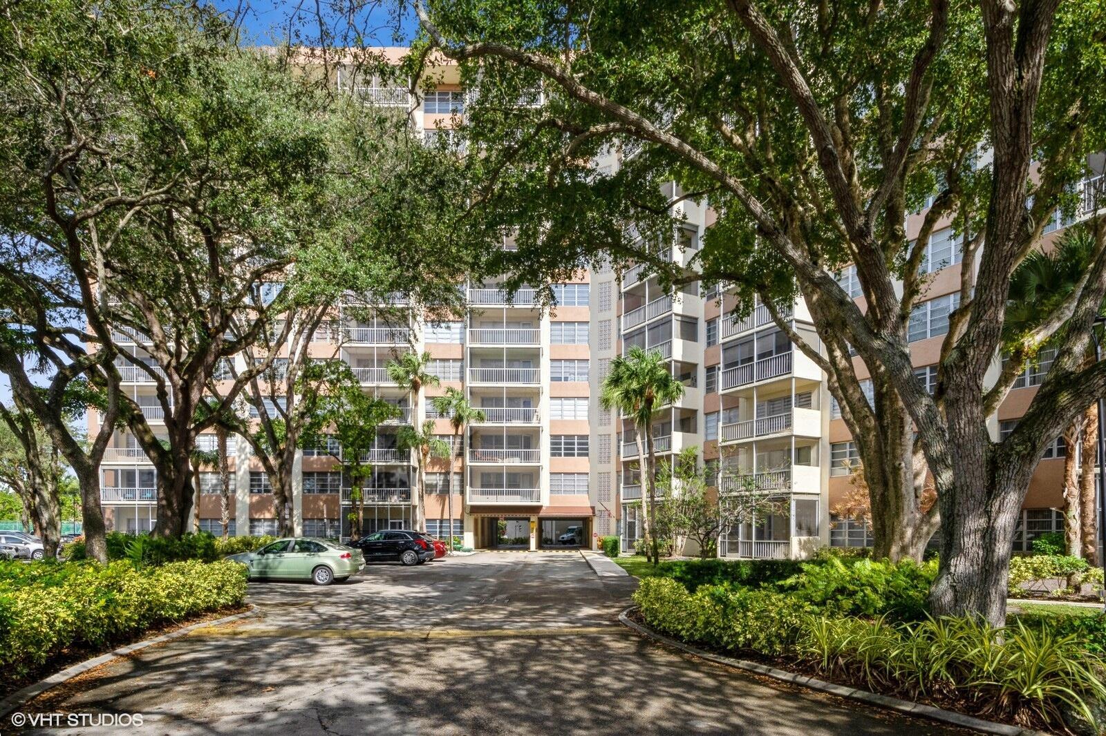 10777 West Sample Road, Unit 101 Coral Springs, FL 33065 - Photo 1 of 36 front view of a building