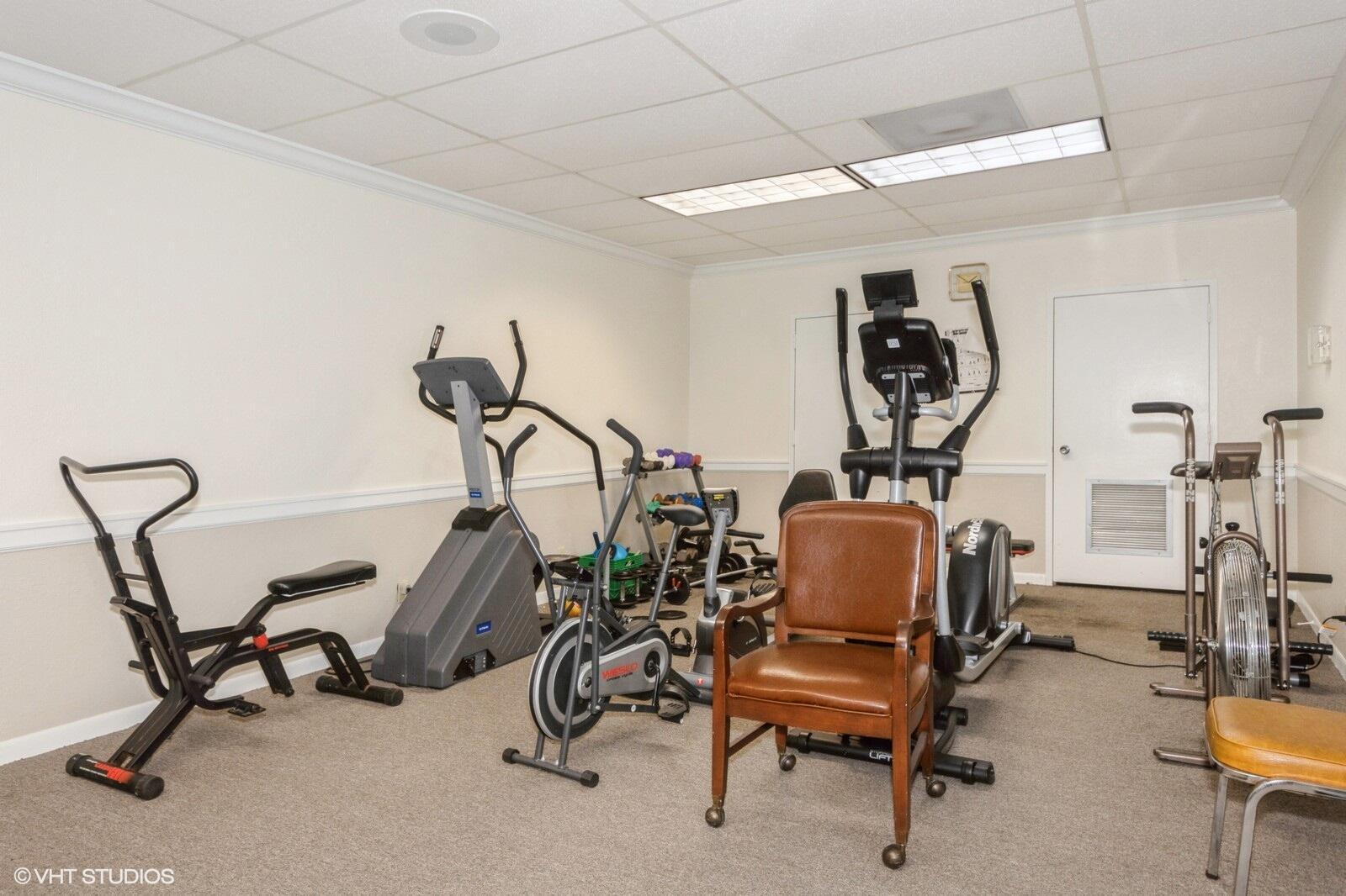 10777 West Sample Road, Unit 101 Coral Springs, FL 33065 - Photo 33 of 36 a view of a room with gym equipment