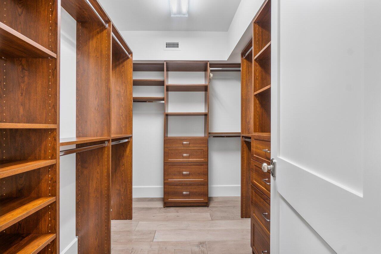 3322 Casseekey Island Road, Unit 202 Jupiter, FL 33477 - Photo 8 of 25 Master Suite 1- Walk in Closet