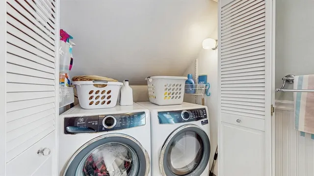 a utility room with dryer and washer