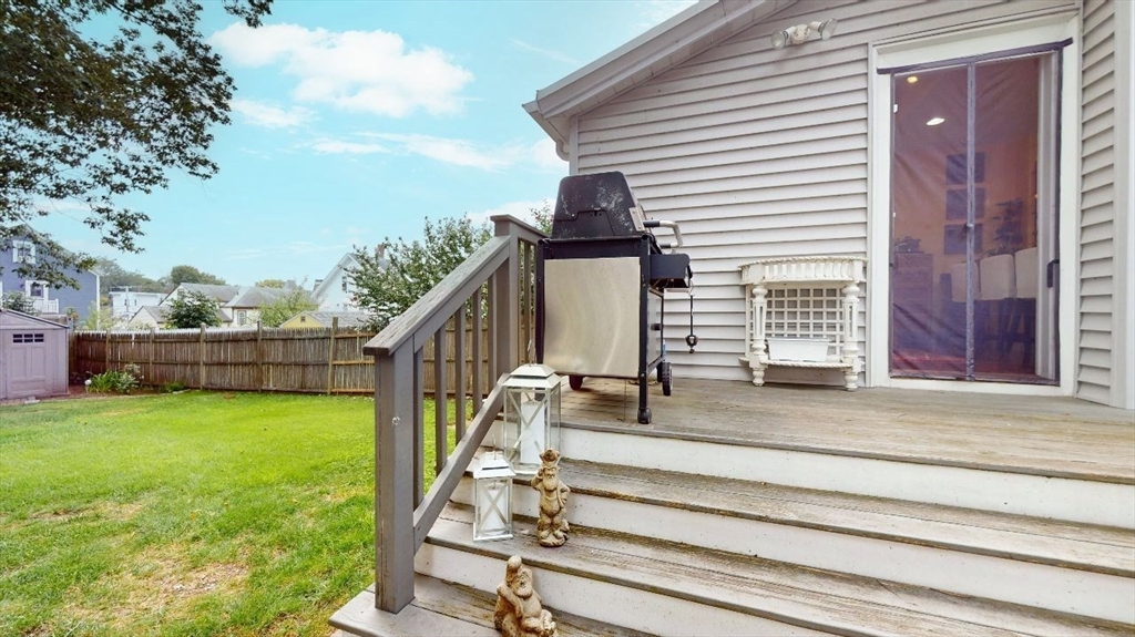 13 Robbins Street, Unit 1 Waltham, MA 02453 - Photo 23 of 29 a view of a house with backyard and deck