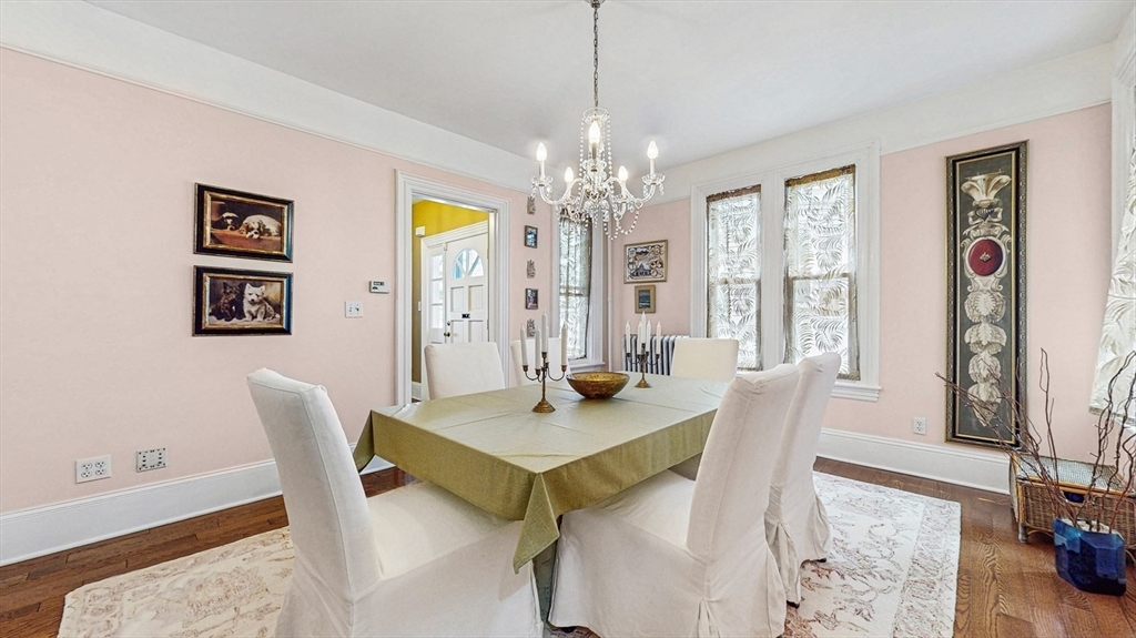 13 Robbins Street, Unit 1 Waltham, MA 02453 - Photo 5 of 29 a view of a dining room with furniture and window