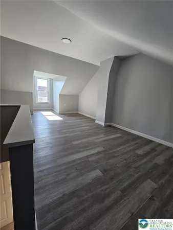 a view of balcony with wooden floor