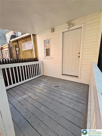 a view of a house with a deck