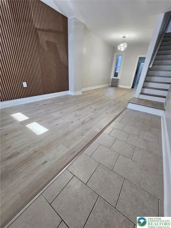 a view of a livingroom with wooden floor