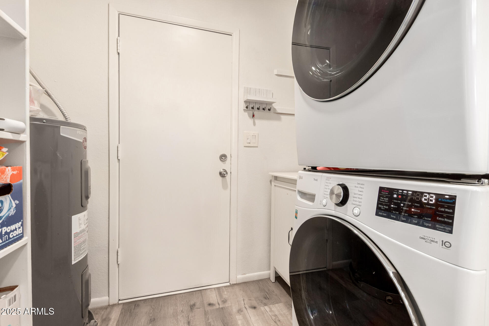 4561 West McLellan Road Glendale, AZ 85301 - Photo 25 of 32 a utility room with dryer and washer