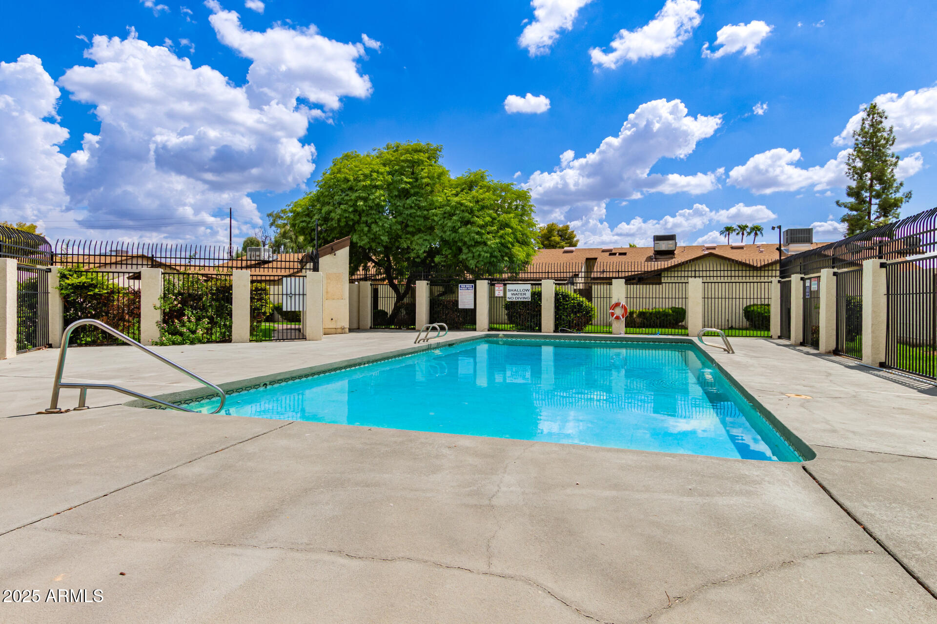 4561 West McLellan Road Glendale, AZ 85301 - Photo 32 of 32 a view of swimming pool with a lounge chairs