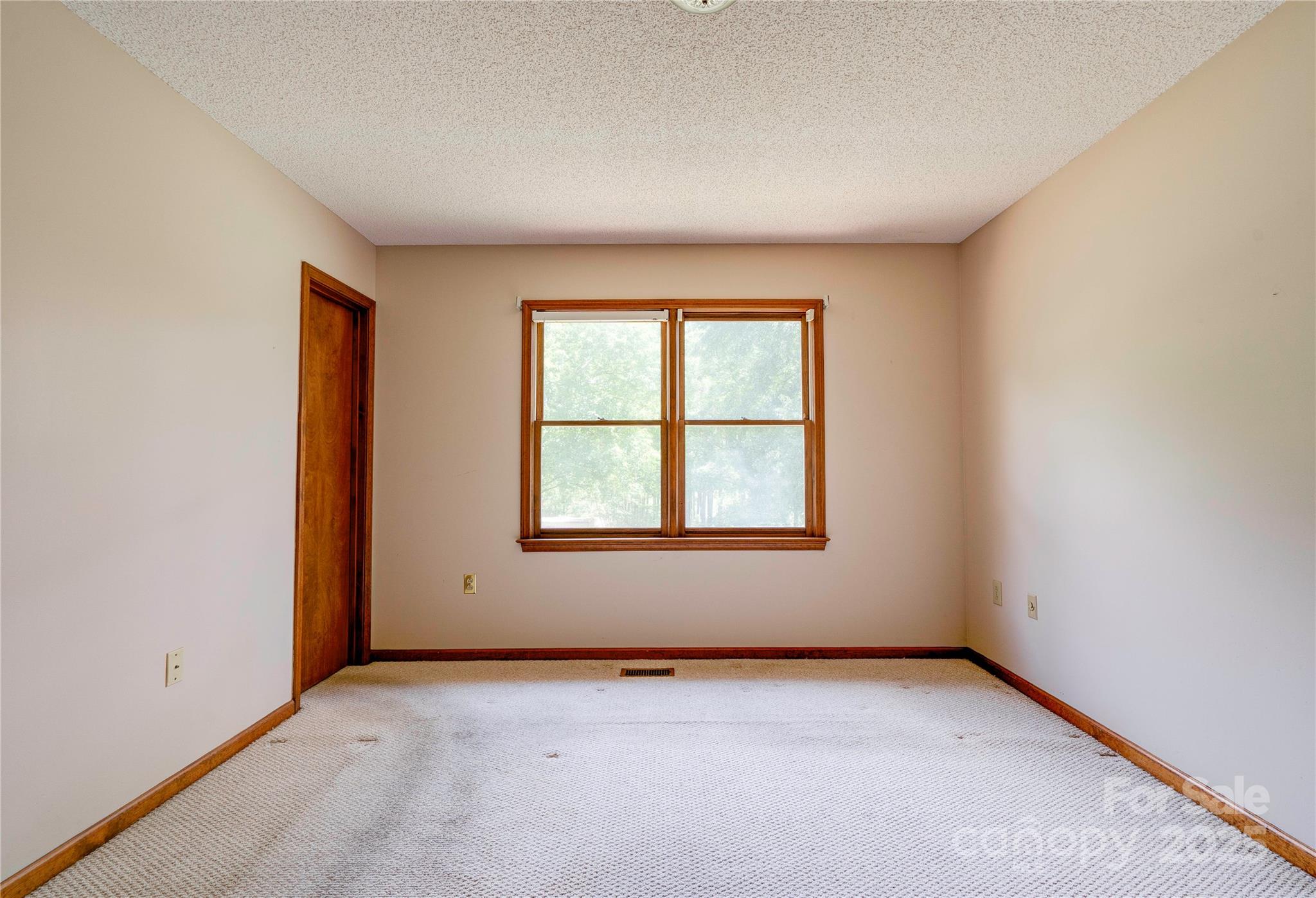145 Ball Park Road Lawndale, NC 28090 - Photo 19 of 37 an empty room with a window