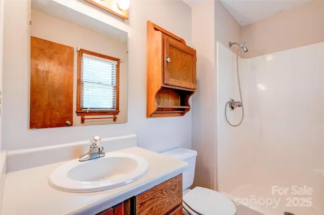 a room with a table and a potted plant