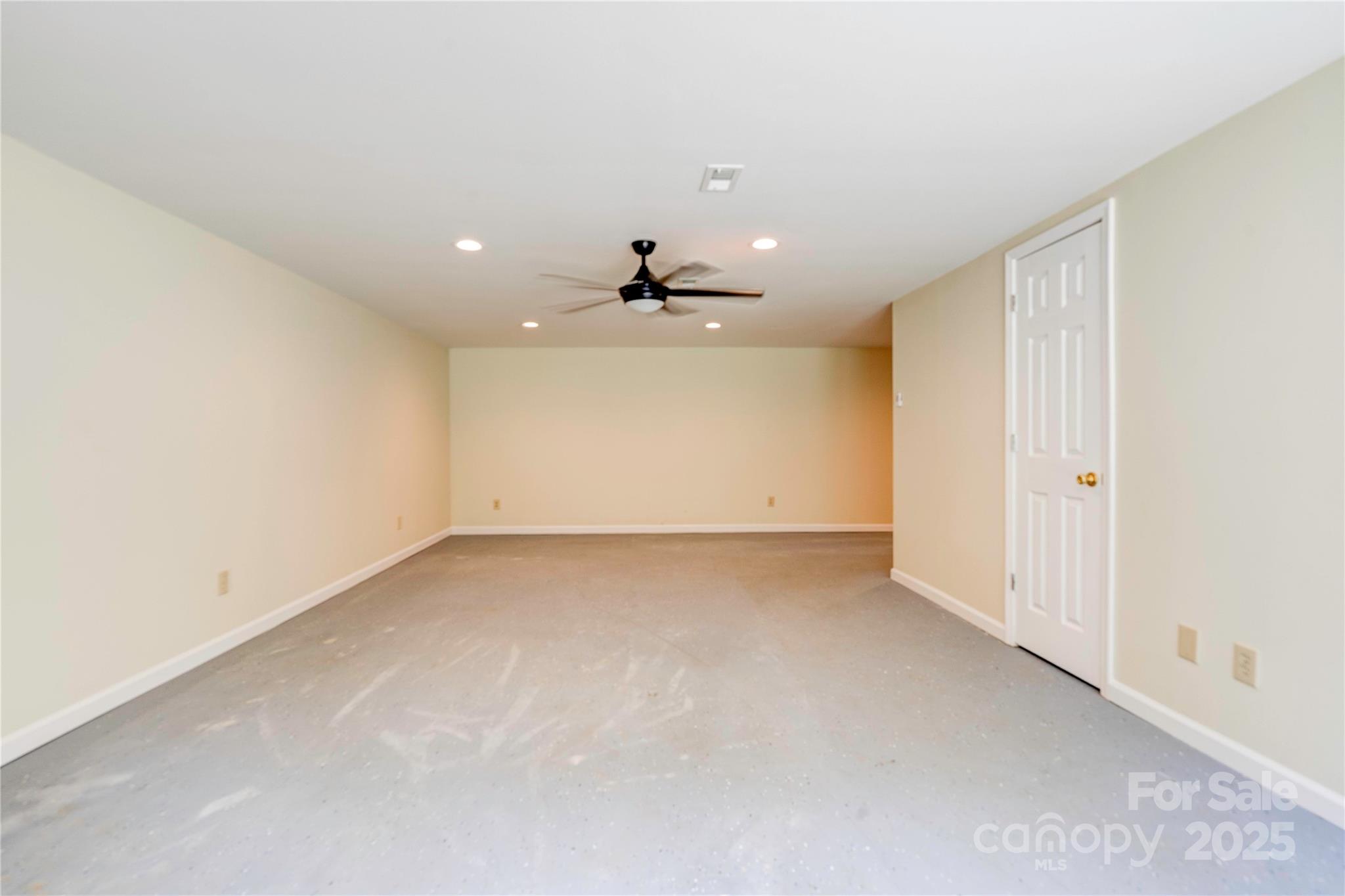 145 Ball Park Road Lawndale, NC 28090 - Photo 26 of 37 an empty room with a ceiling fan and window