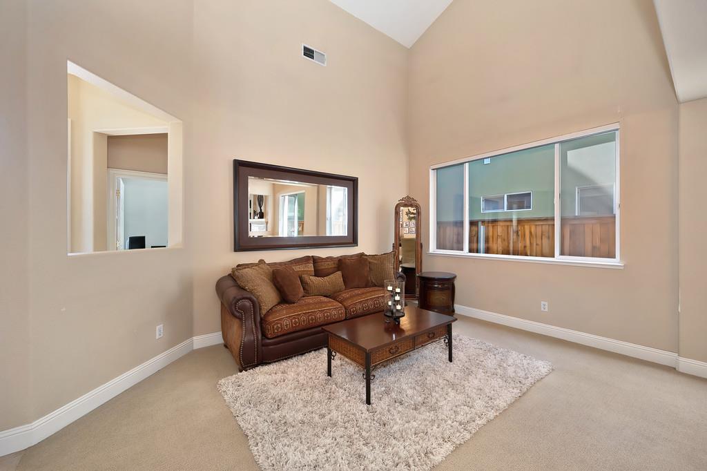 1685 Iroquois Road Rocklin, CA 95765 - Photo 11 of 73 a living room with furniture and a window
