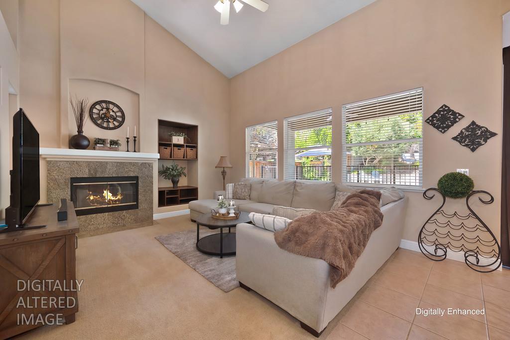 1685 Iroquois Road Rocklin, CA 95765 - Photo 17 of 73 a living room with furniture and a fireplace