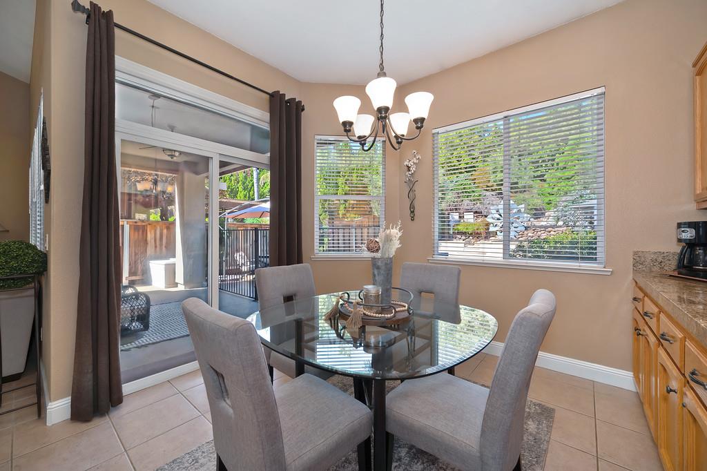 1685 Iroquois Road Rocklin, CA 95765 - Photo 25 of 73 a view of a dining room with furniture window and outside view