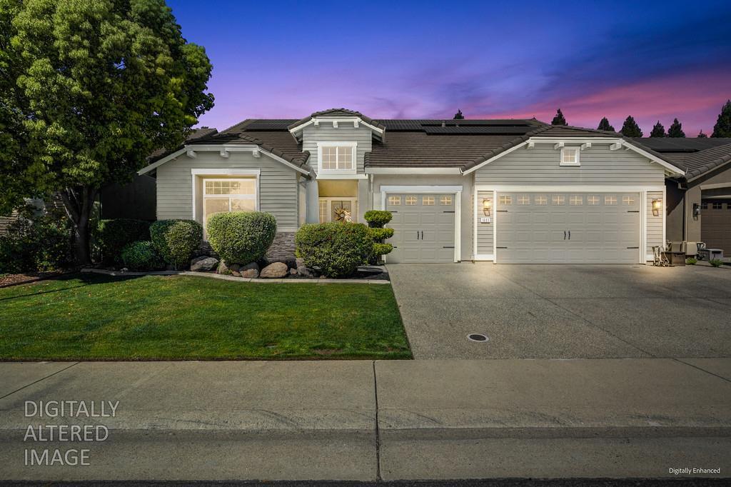 1685 Iroquois Road Rocklin, CA 95765 - Photo 5 of 73 a front view of a house with a garden