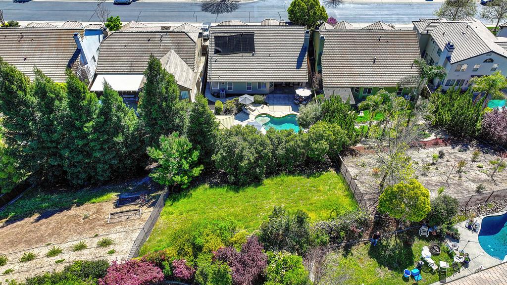 1685 Iroquois Road Rocklin, CA 95765 - Photo 64 of 73 an aerial view of a house with a yard and large tree