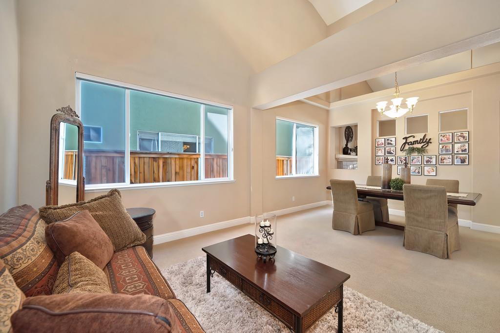 1685 Iroquois Road Rocklin, CA 95765 - Photo 8 of 73 a living room with furniture and windows