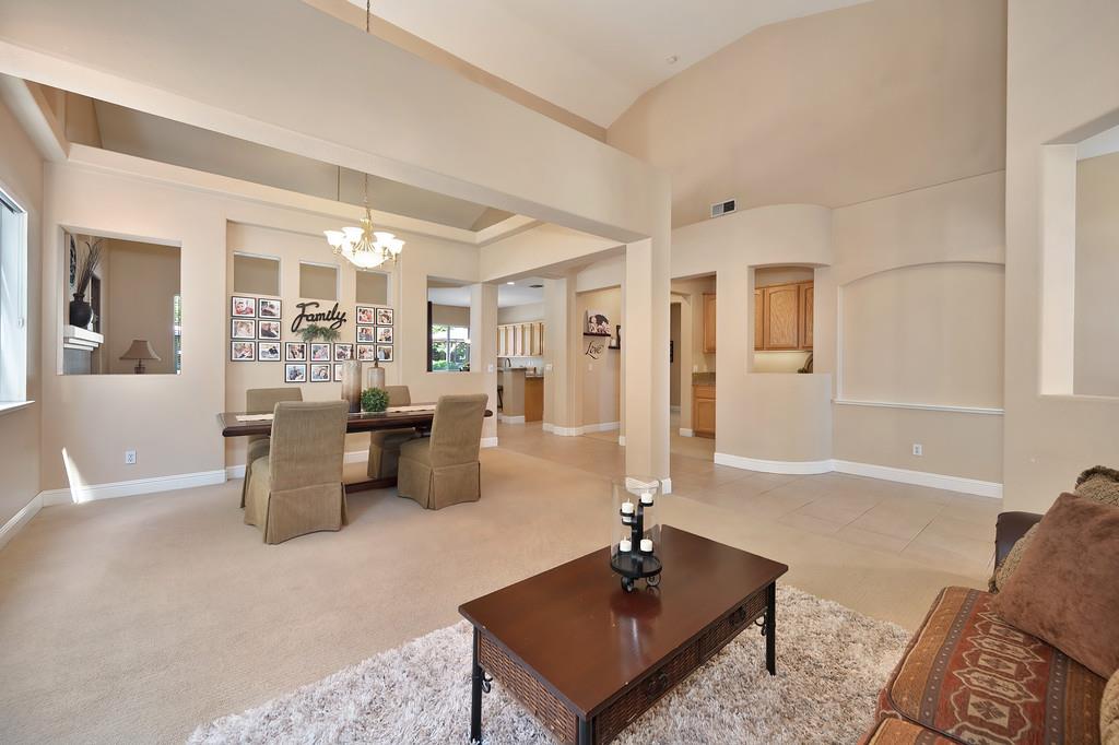 1685 Iroquois Road Rocklin, CA 95765 - Photo 9 of 73 a living room with furniture and wooden floor