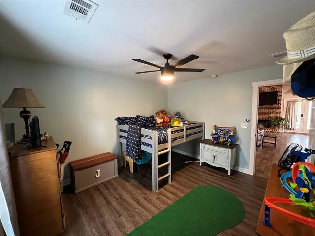 a view of a workspace with furniture and toys