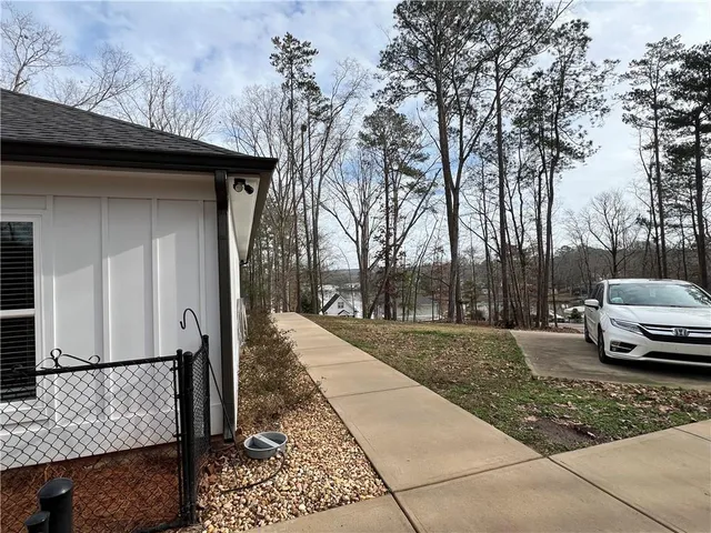 a view of a car parked in front of a house