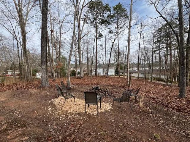 a view of outdoor space with lots of trees