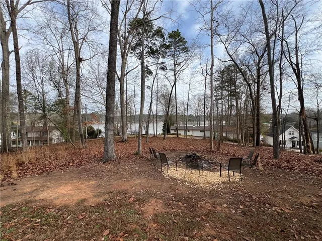 a backyard of a house with lots of green space